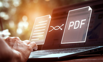 Users convert document to a pdf on a laptop at a desk