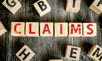 Making an insurance claim - checklist The word claims spelled out by wooden bricks
