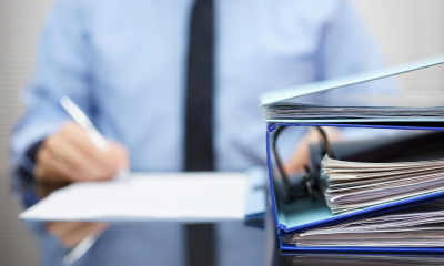 Businessman filling in a VAT return